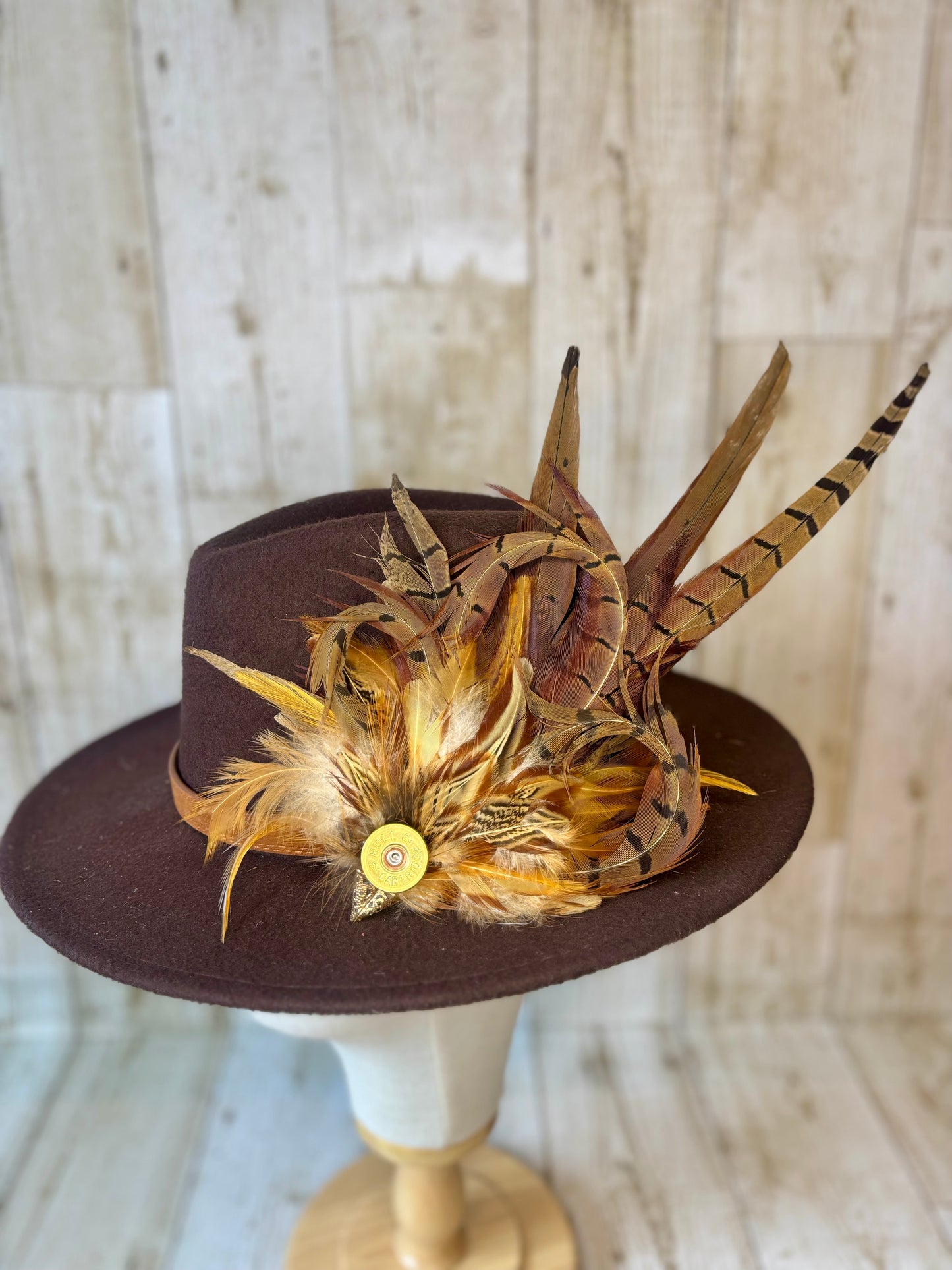 Pheasant feather hat pin.