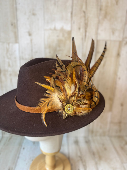 Pheasant feather hat pin.