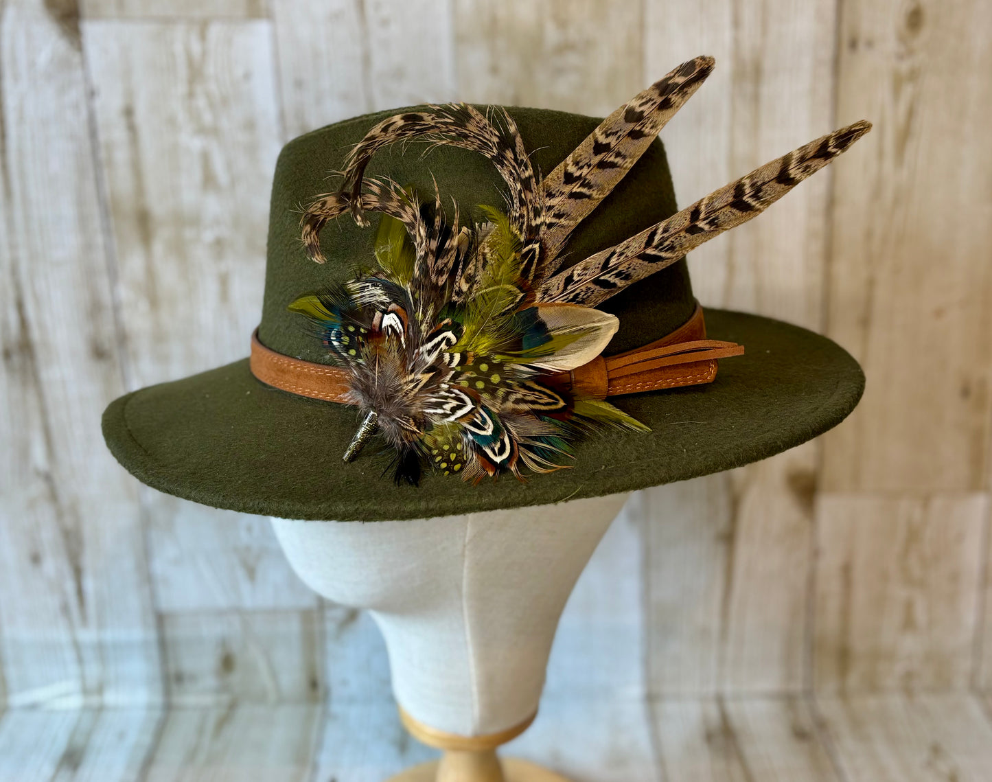 Pheasant feather hat pin.