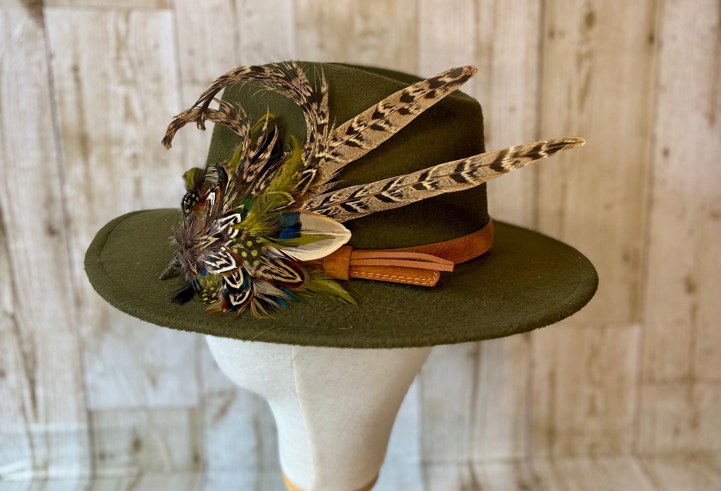 Pheasant feather hat pin.