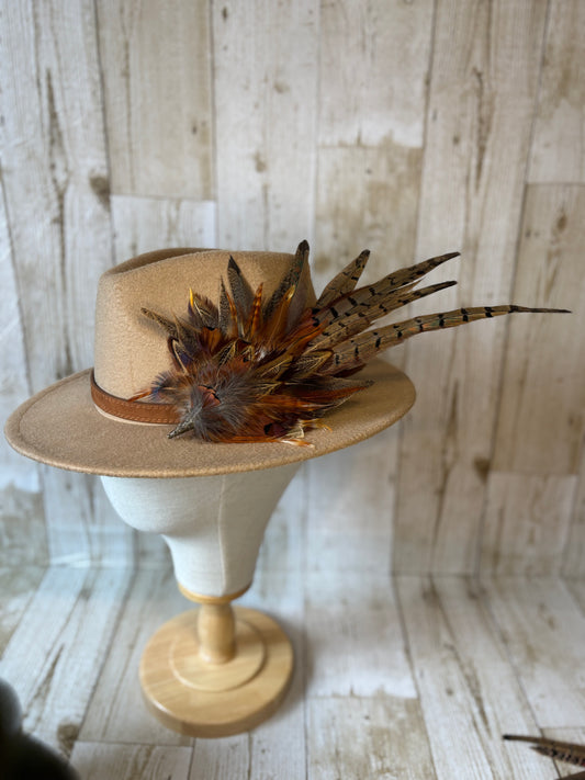 Pheasant feather hat pin.