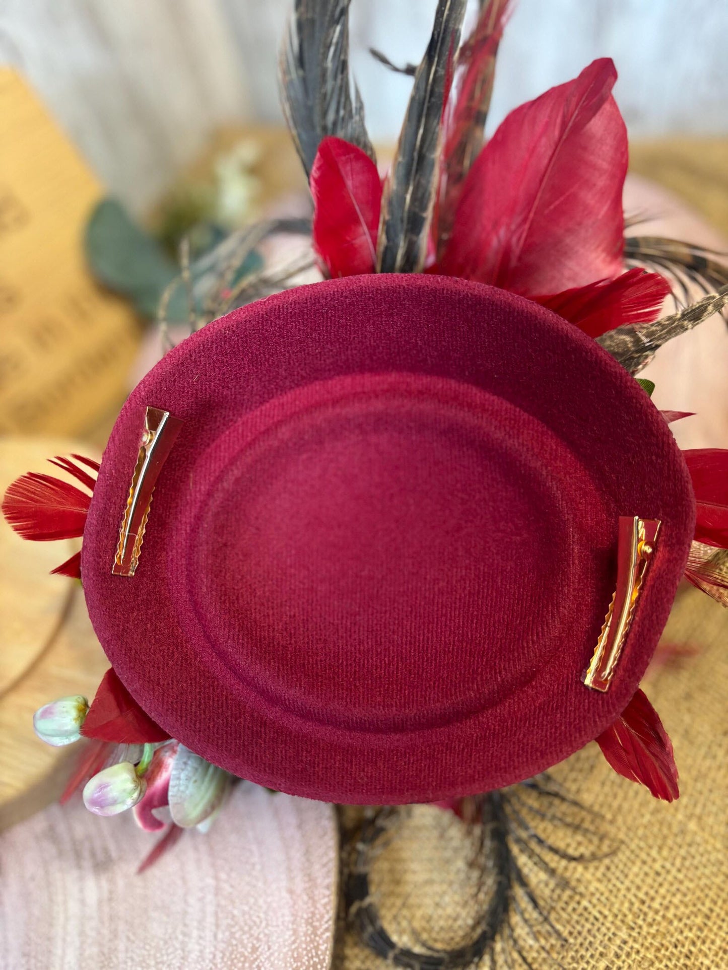 Uniquely designed pheasant feather and sinamay fascinator