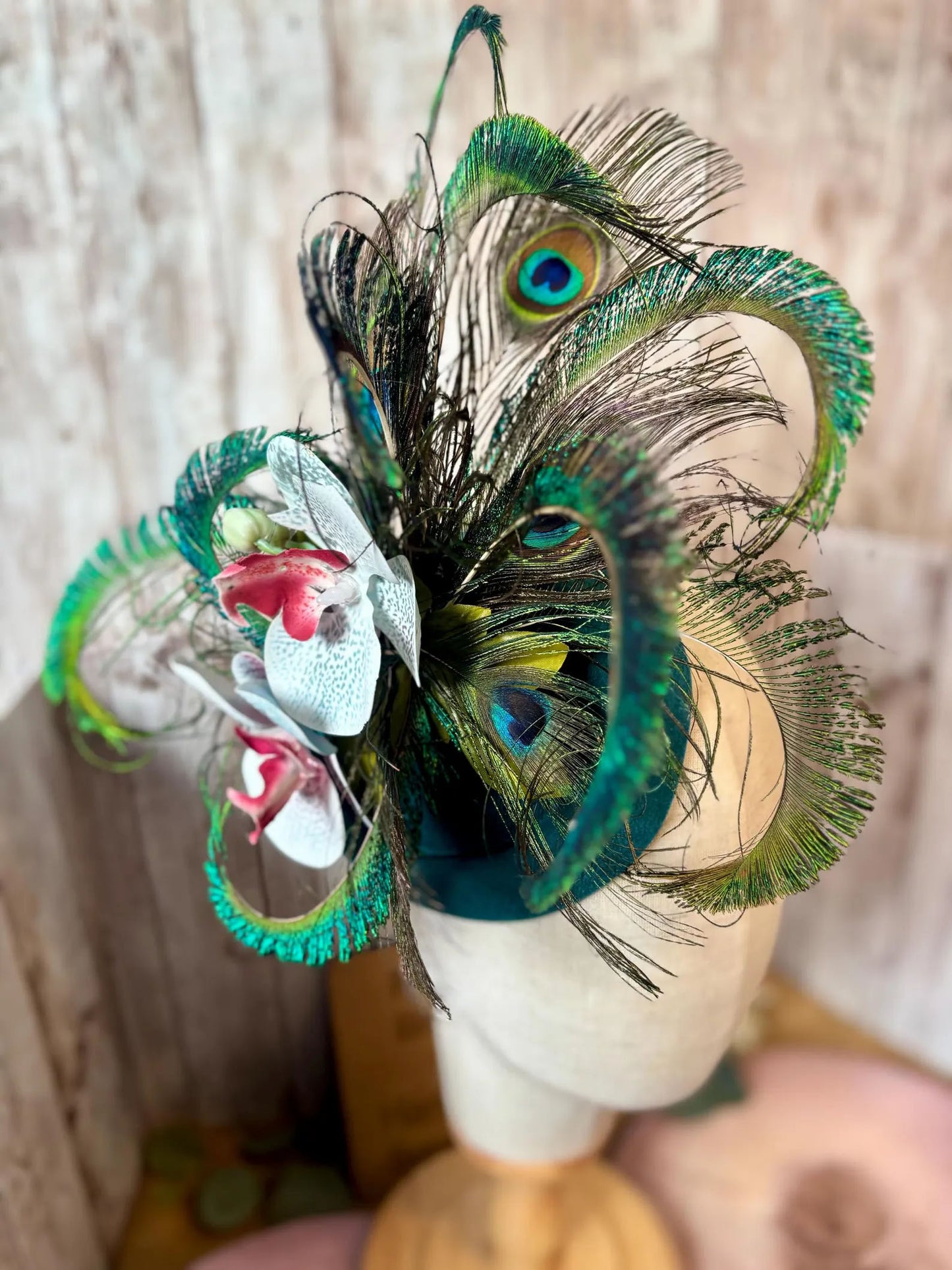Uniquely designed pheasant feather and sinamay fascinator