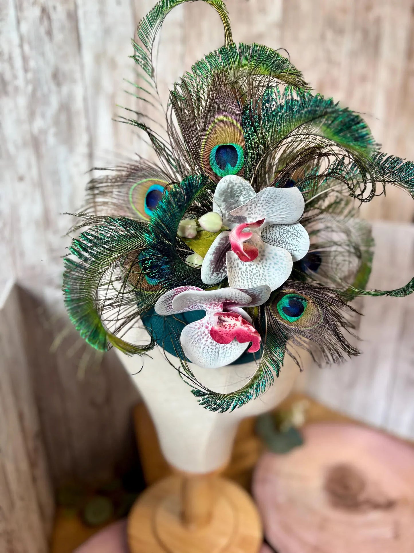 Uniquely designed pheasant feather and sinamay fascinator