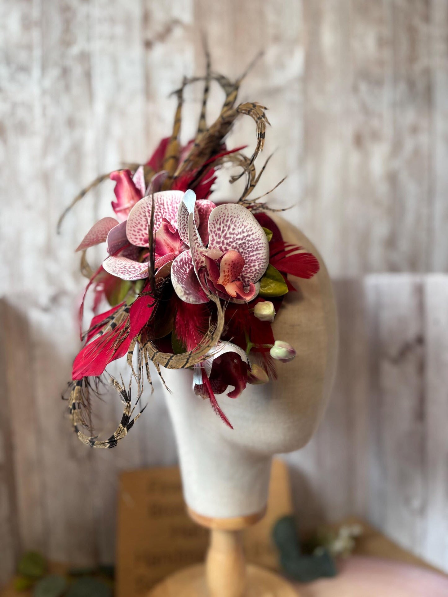 Uniquely designed pheasant feather and sinamay fascinator