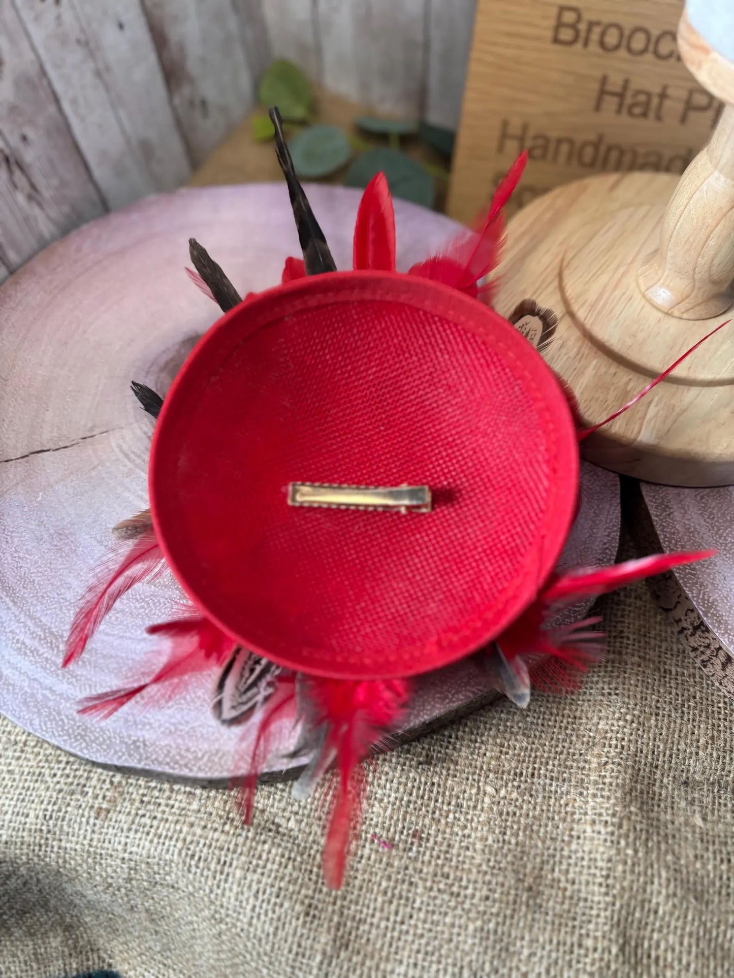 Uniquely designed pheasant feather and sinamay fascinator