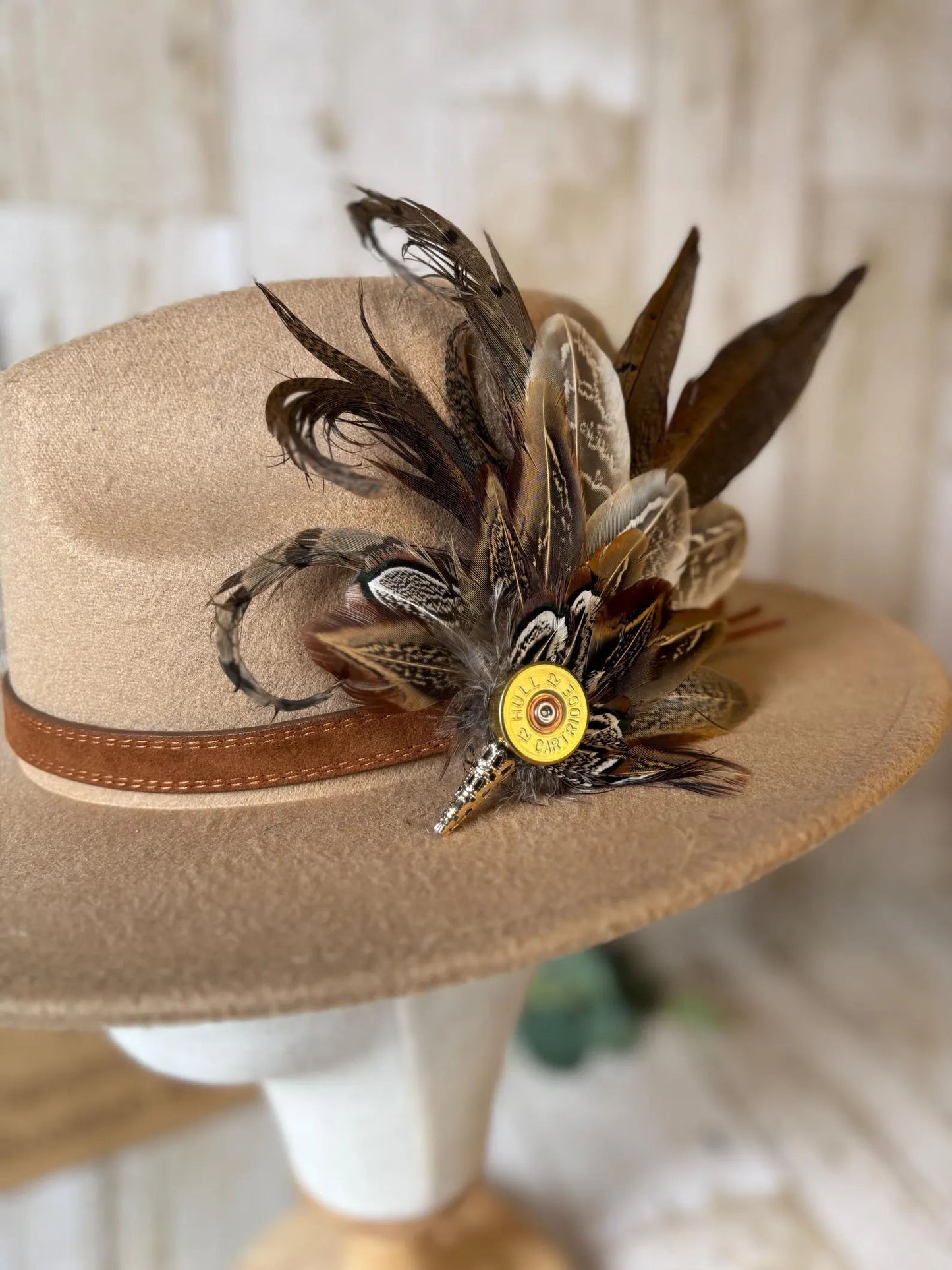 Feather Brooch or Hat Pin with brass cartridge casing