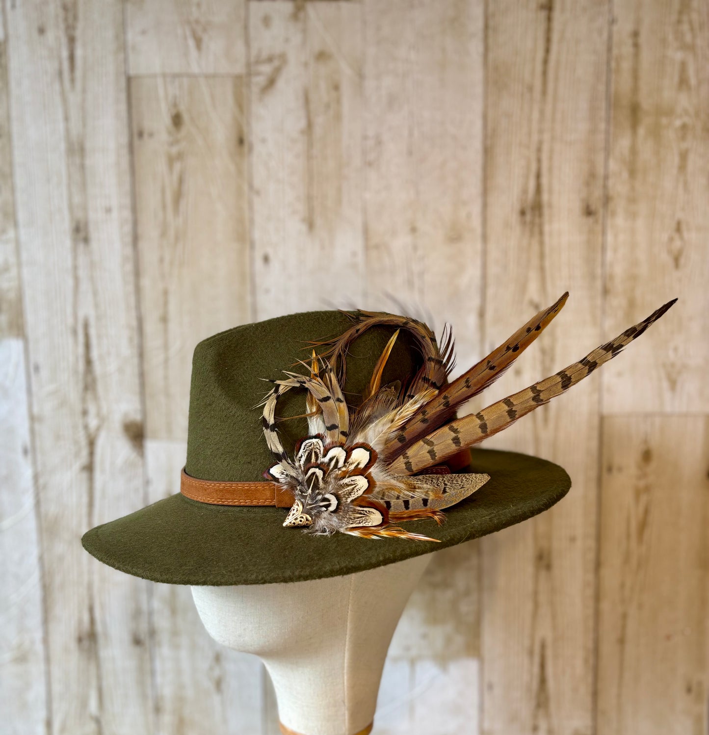 Pheasant feather hat pin.