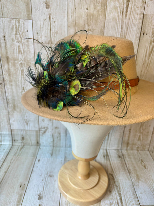 Hat pin with melanistic pheasant and peacock.