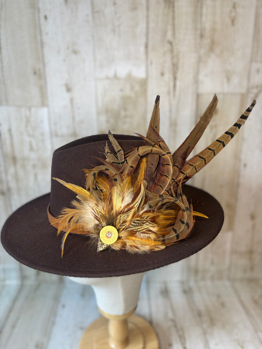 Pheasant feather hat pin.