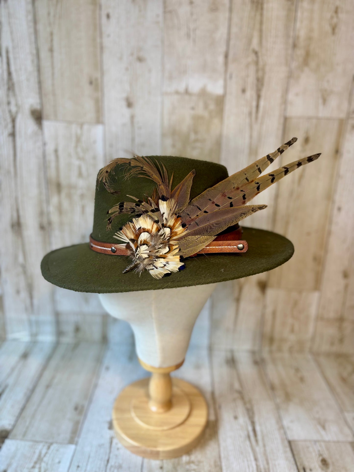 Pheasant feather hat pin.
