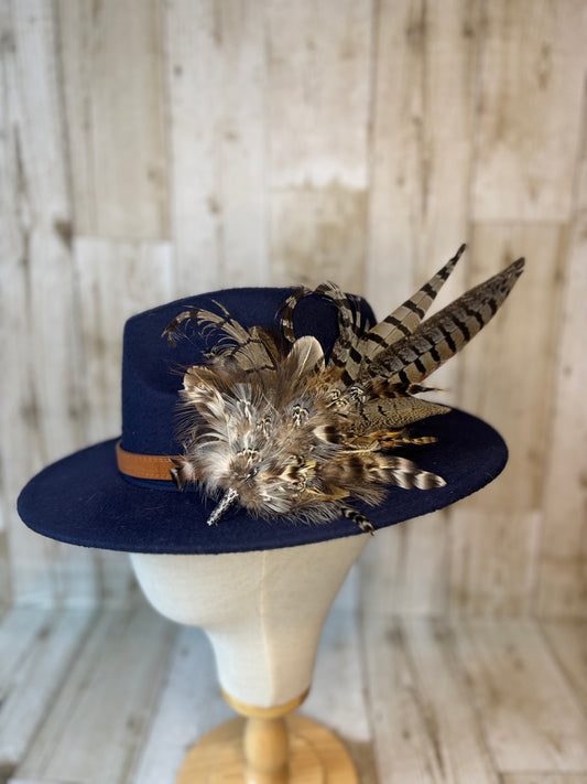 Pheasant feather hat pin.
