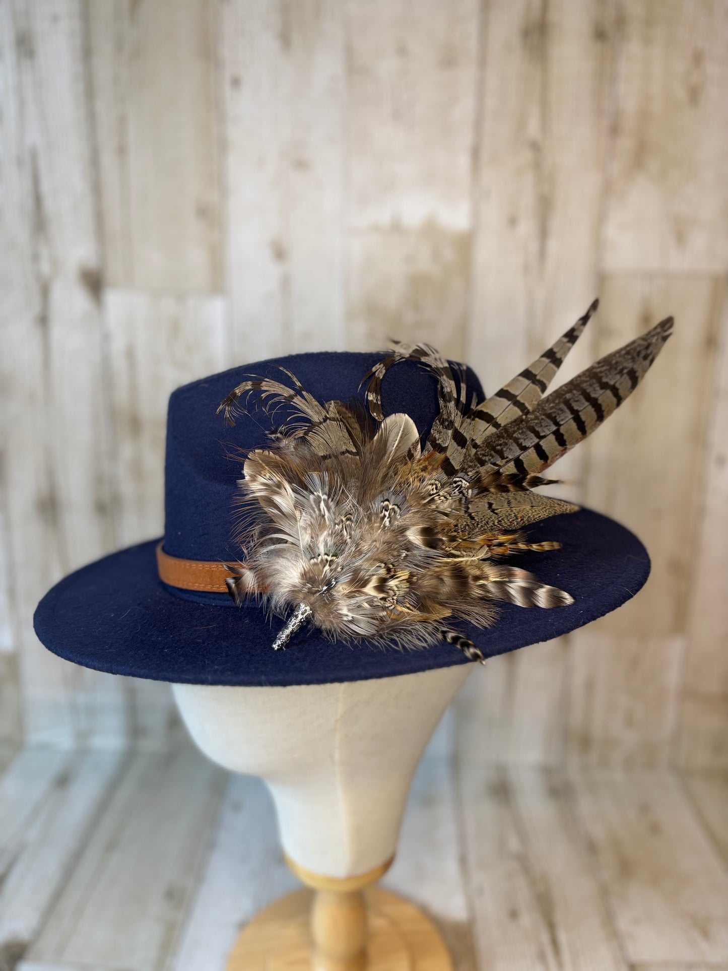 Pheasant feather hat pin.