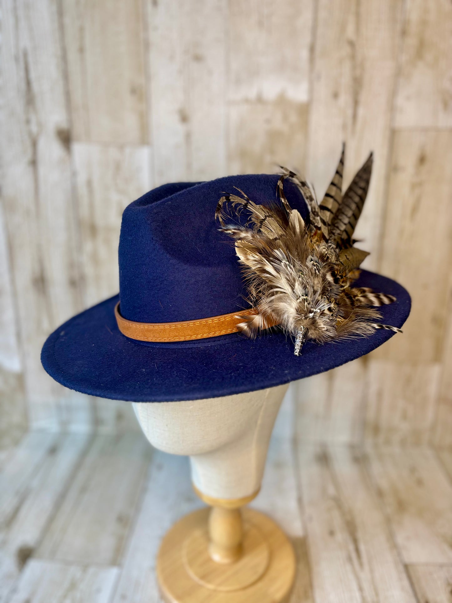Pheasant feather hat pin.