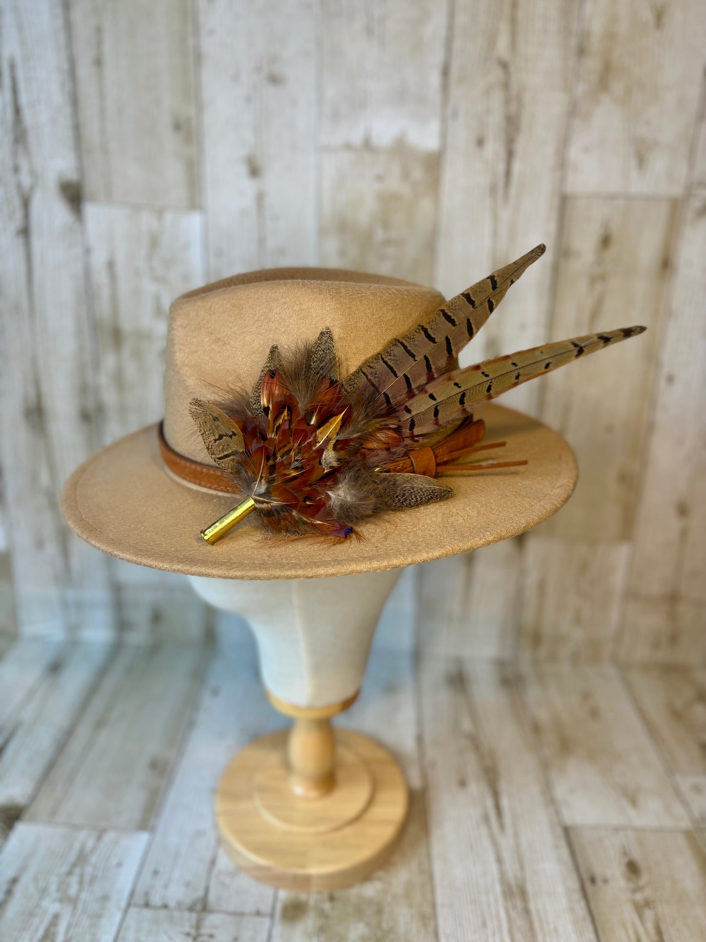 Pheasant feather hat pin.