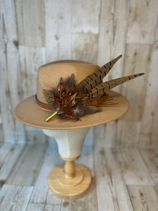 Pheasant feather hat pin.