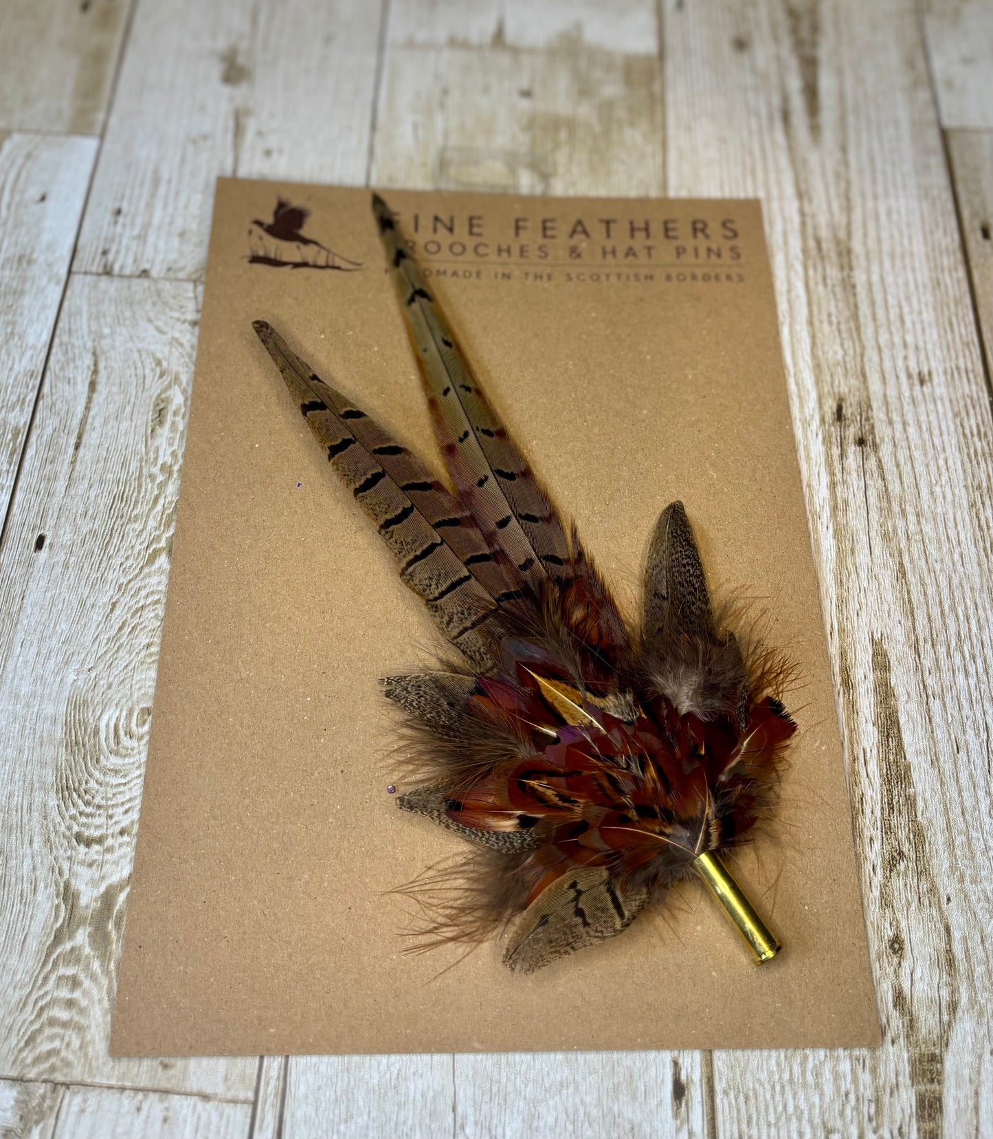 Pheasant feather hat pin.
