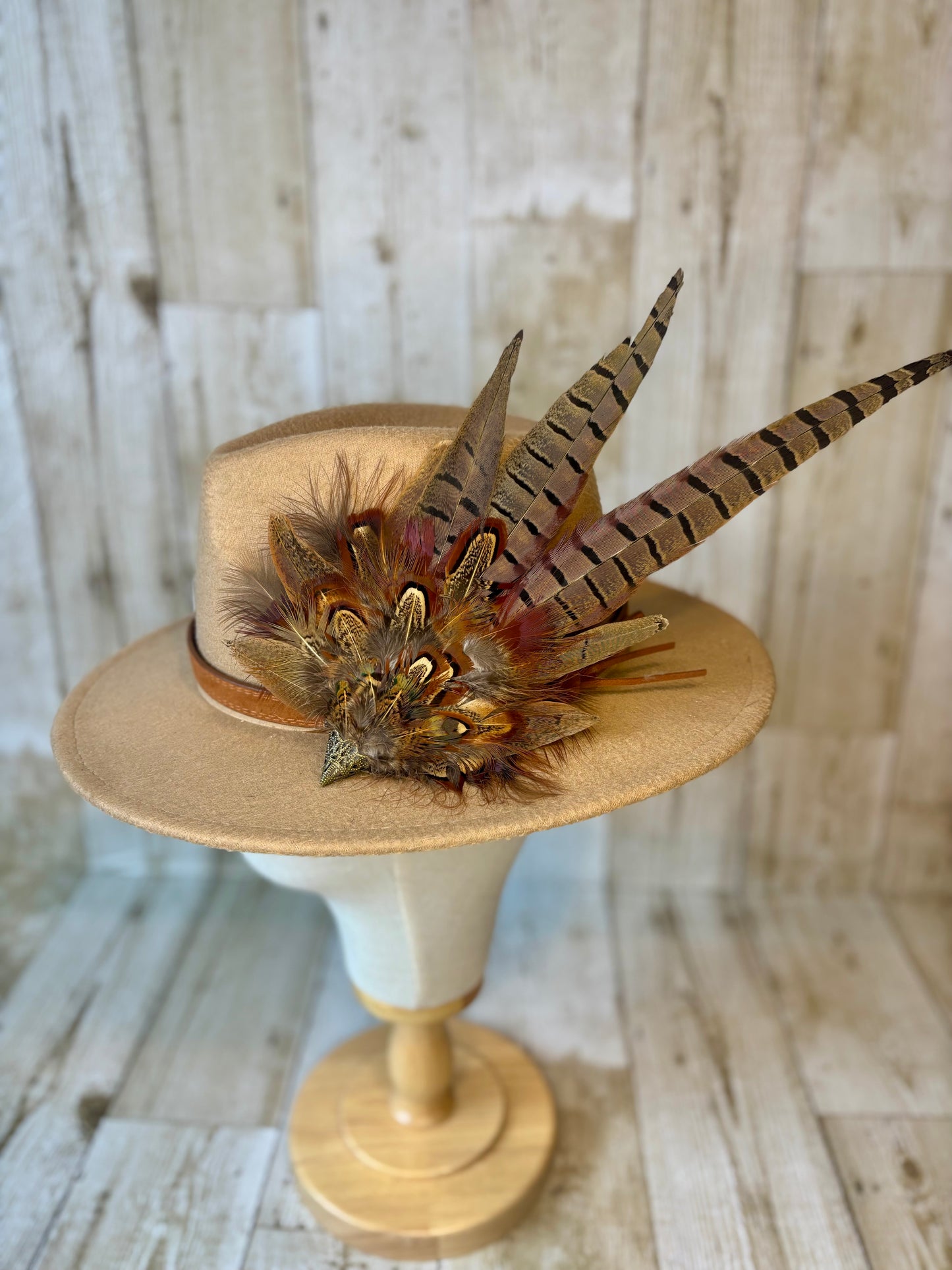 Pheasant feather hat pin.