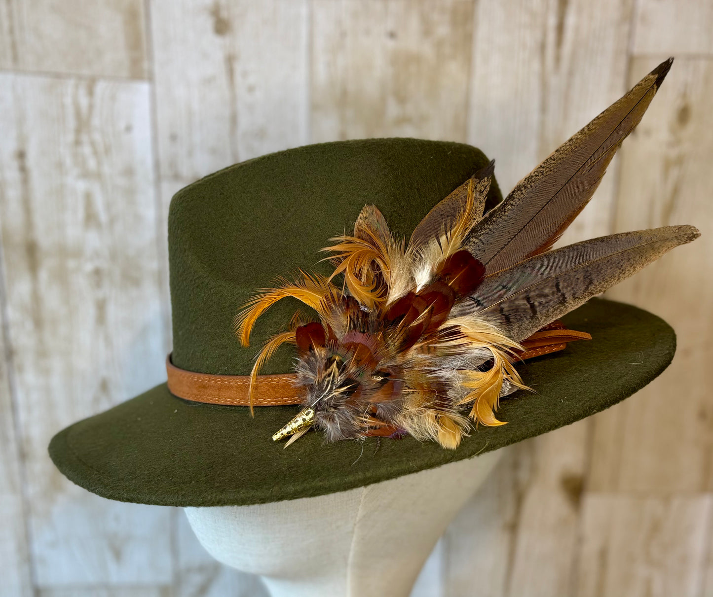Pheasant feather hat pin.