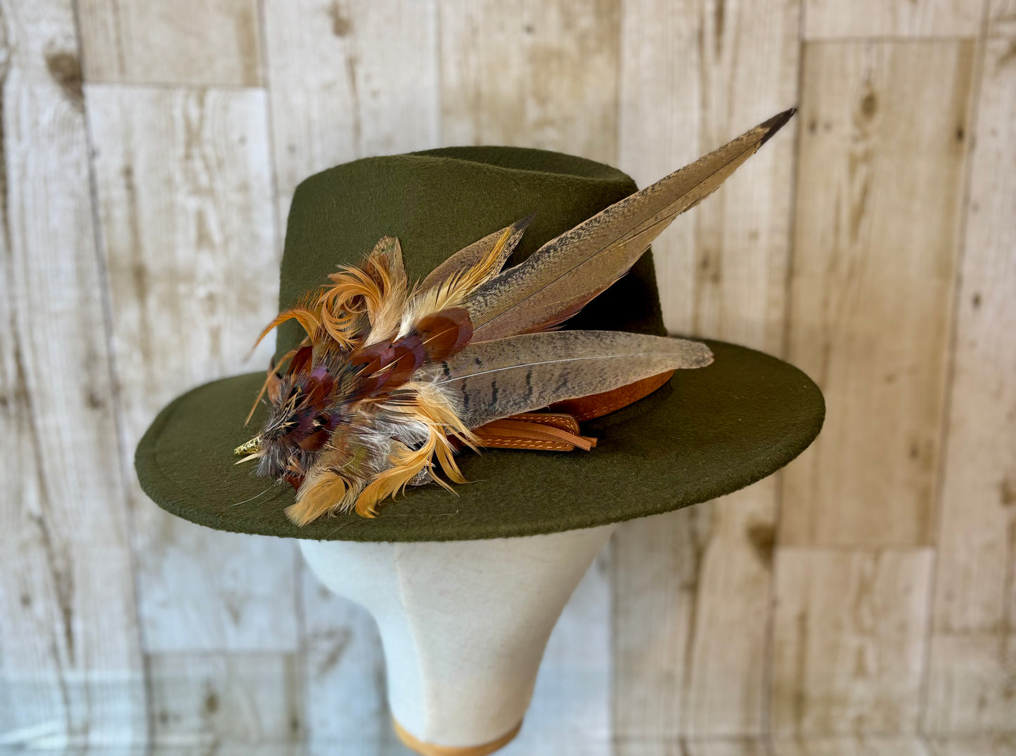 Pheasant feather hat pin.