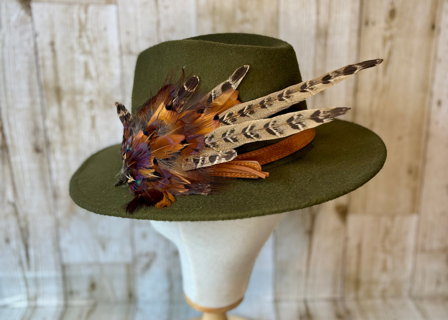 Pheasant feather hat pin.
