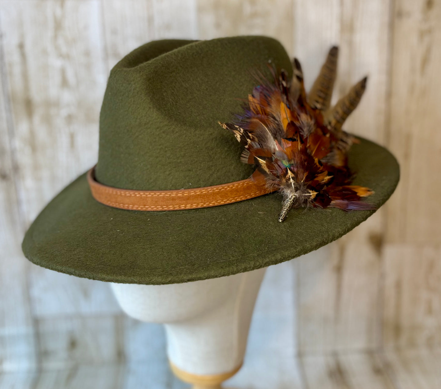 Pheasant feather hat pin.