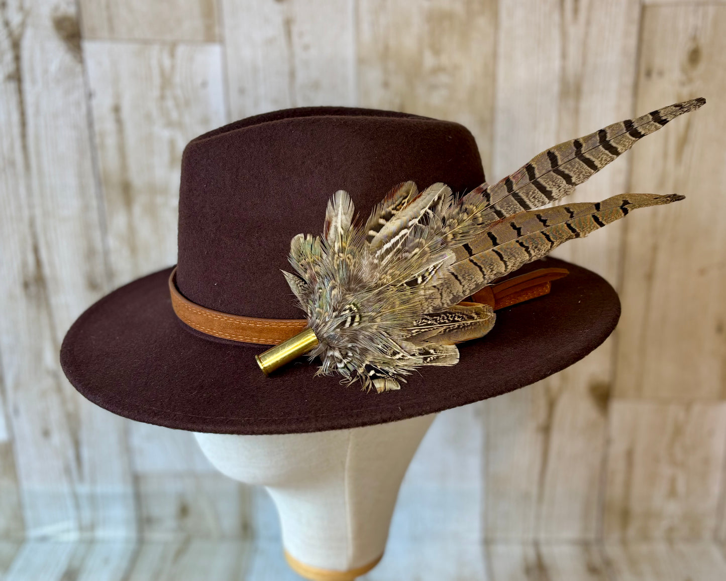 Pheasant feather hat pin.