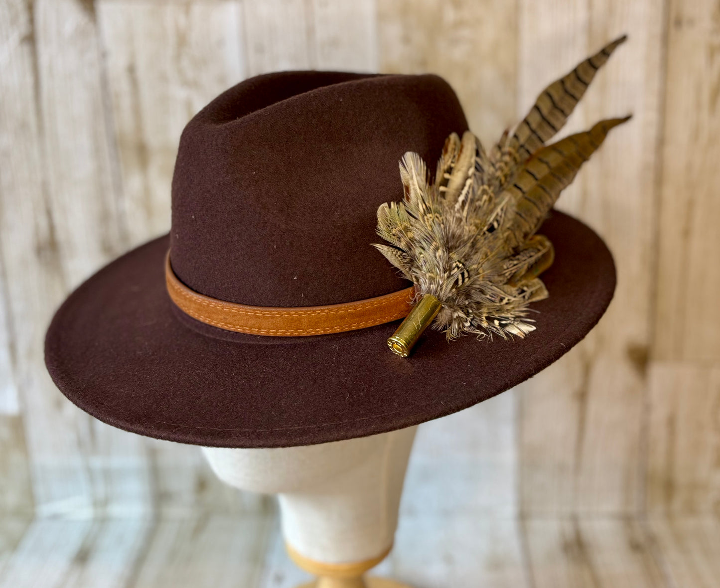 Pheasant feather hat pin.