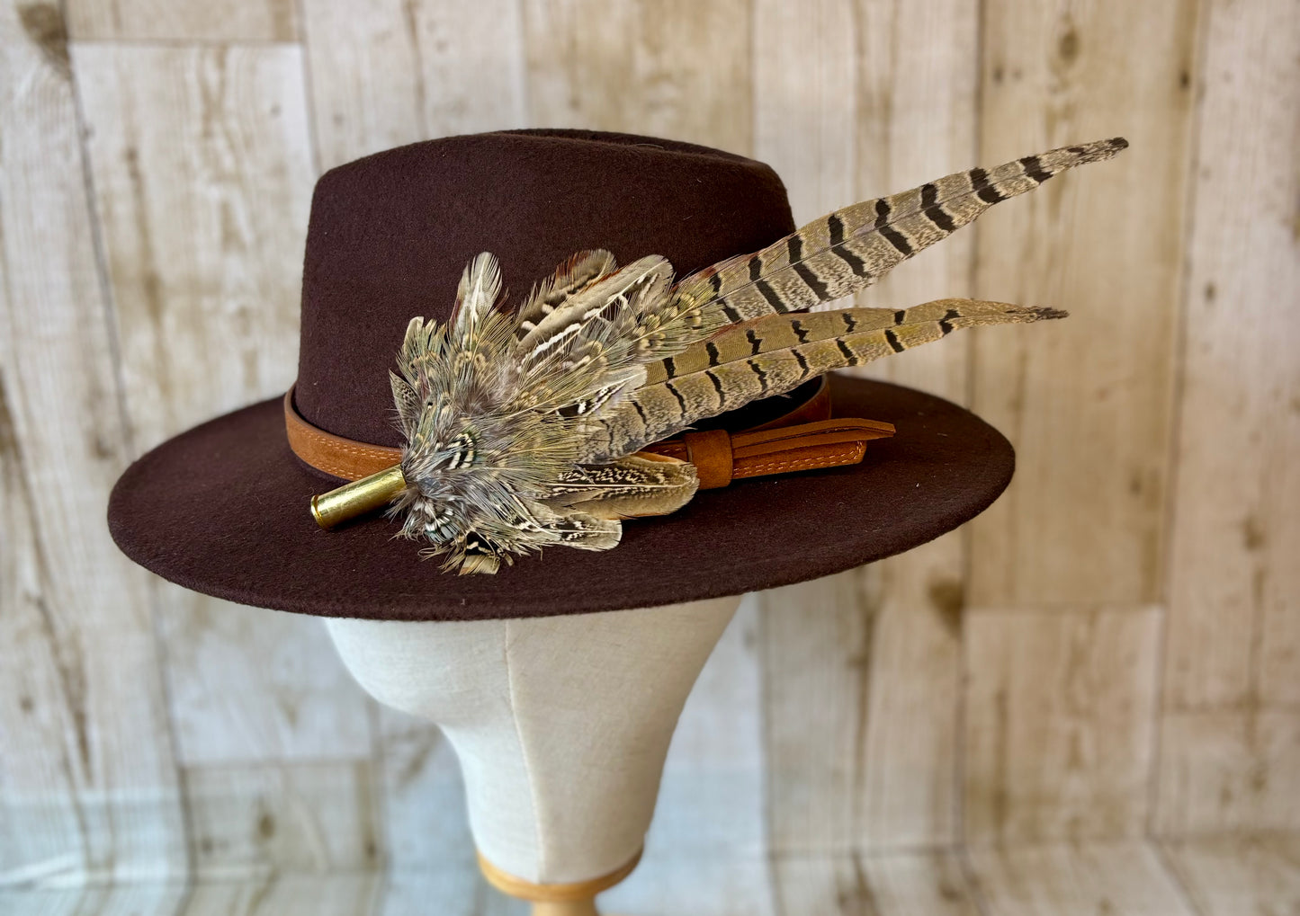 Pheasant feather hat pin.