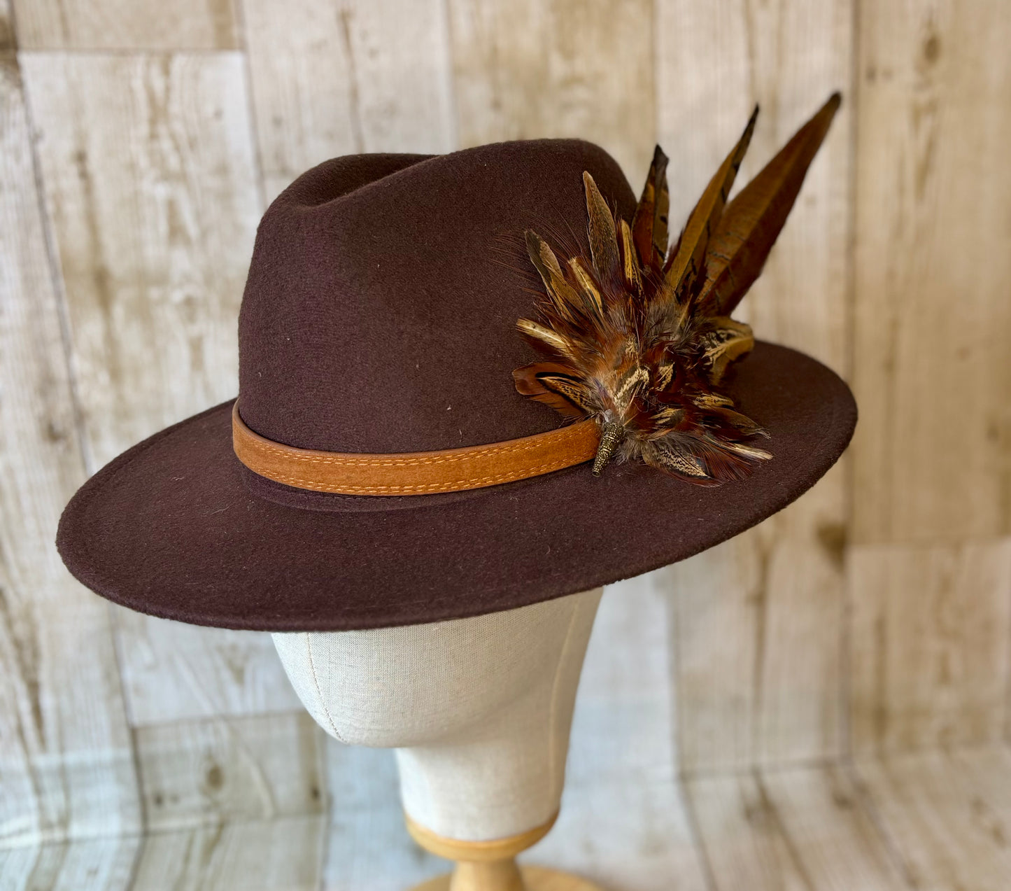 Pheasant feather hat pin.