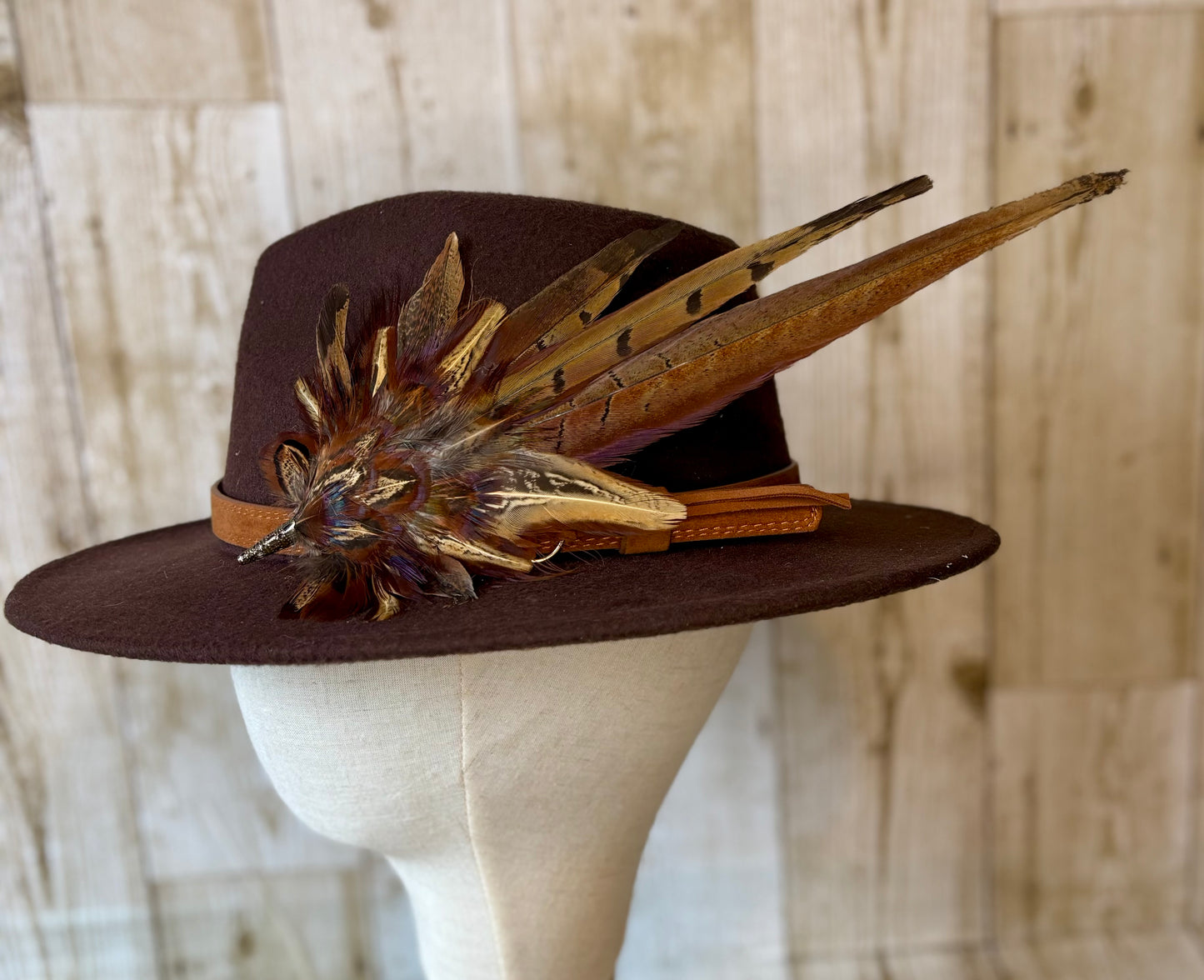 Pheasant feather hat pin.