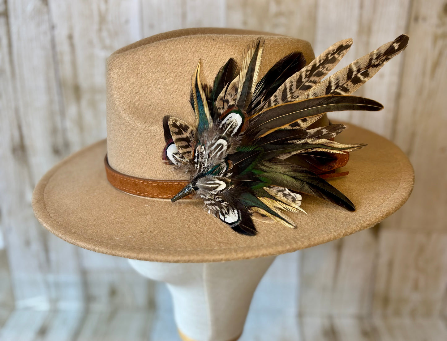 Pheasant feather hat pin.