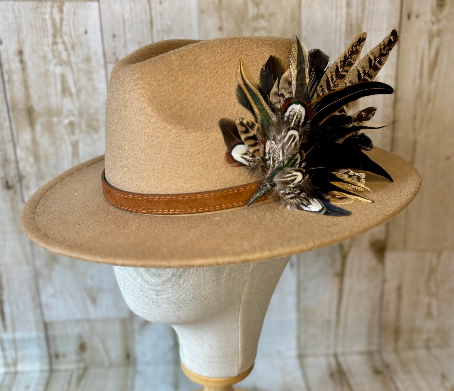 Pheasant feather hat pin.