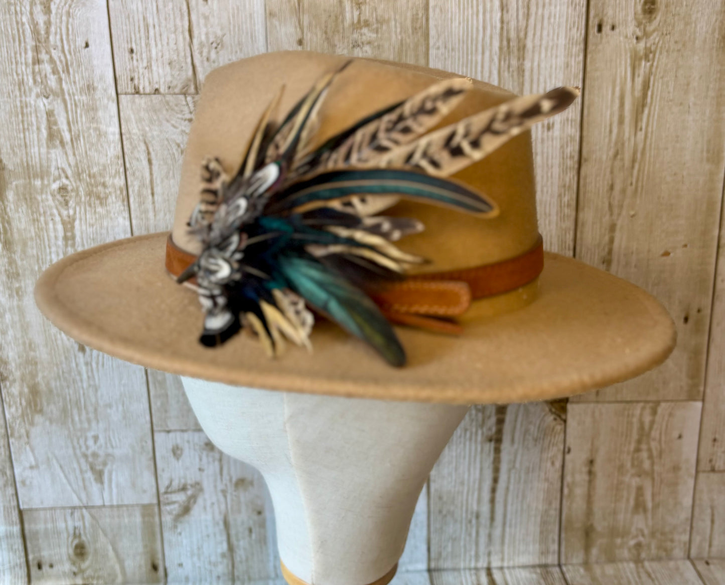 Pheasant feather hat pin.