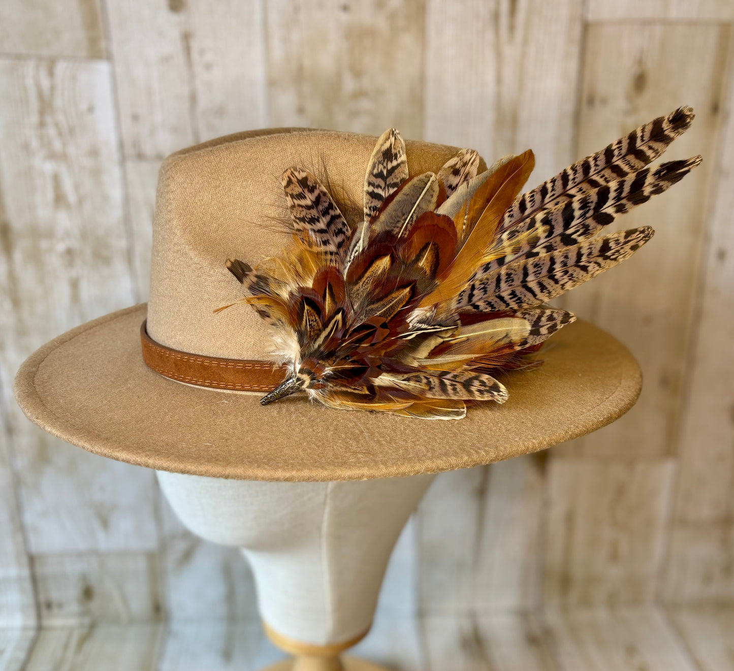 Pheasant feather hat pin.