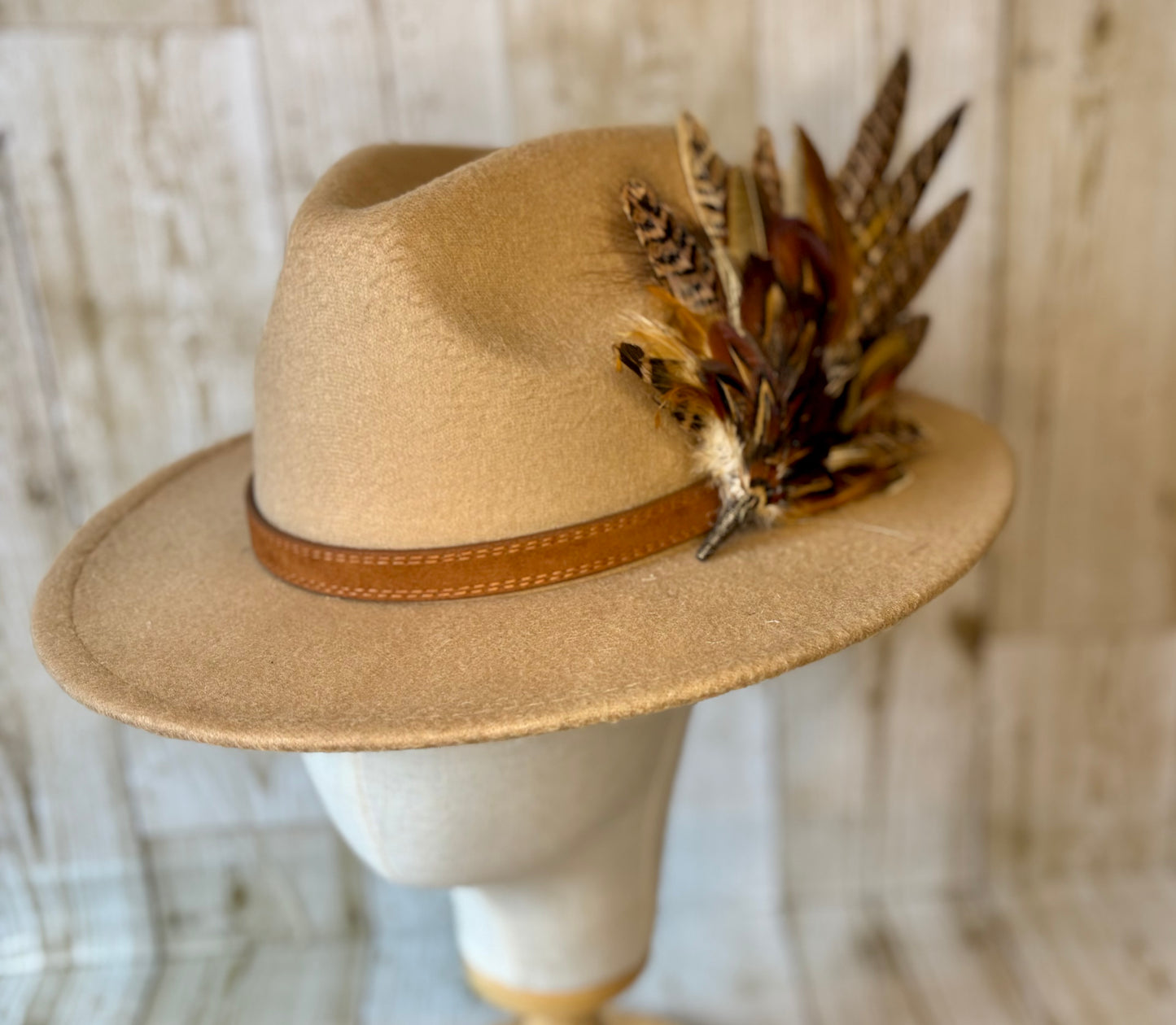 Pheasant feather hat pin.