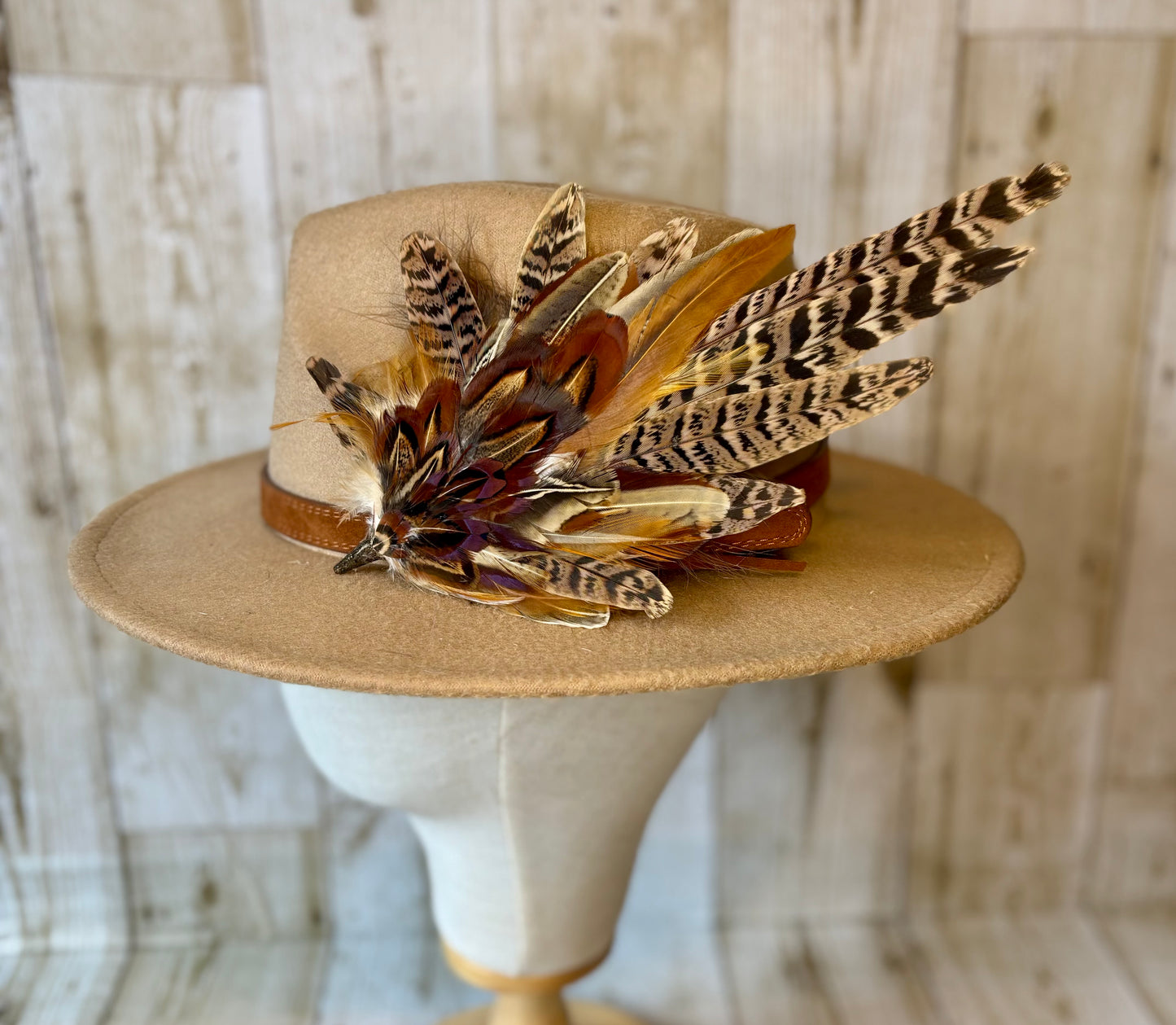 Pheasant feather hat pin.