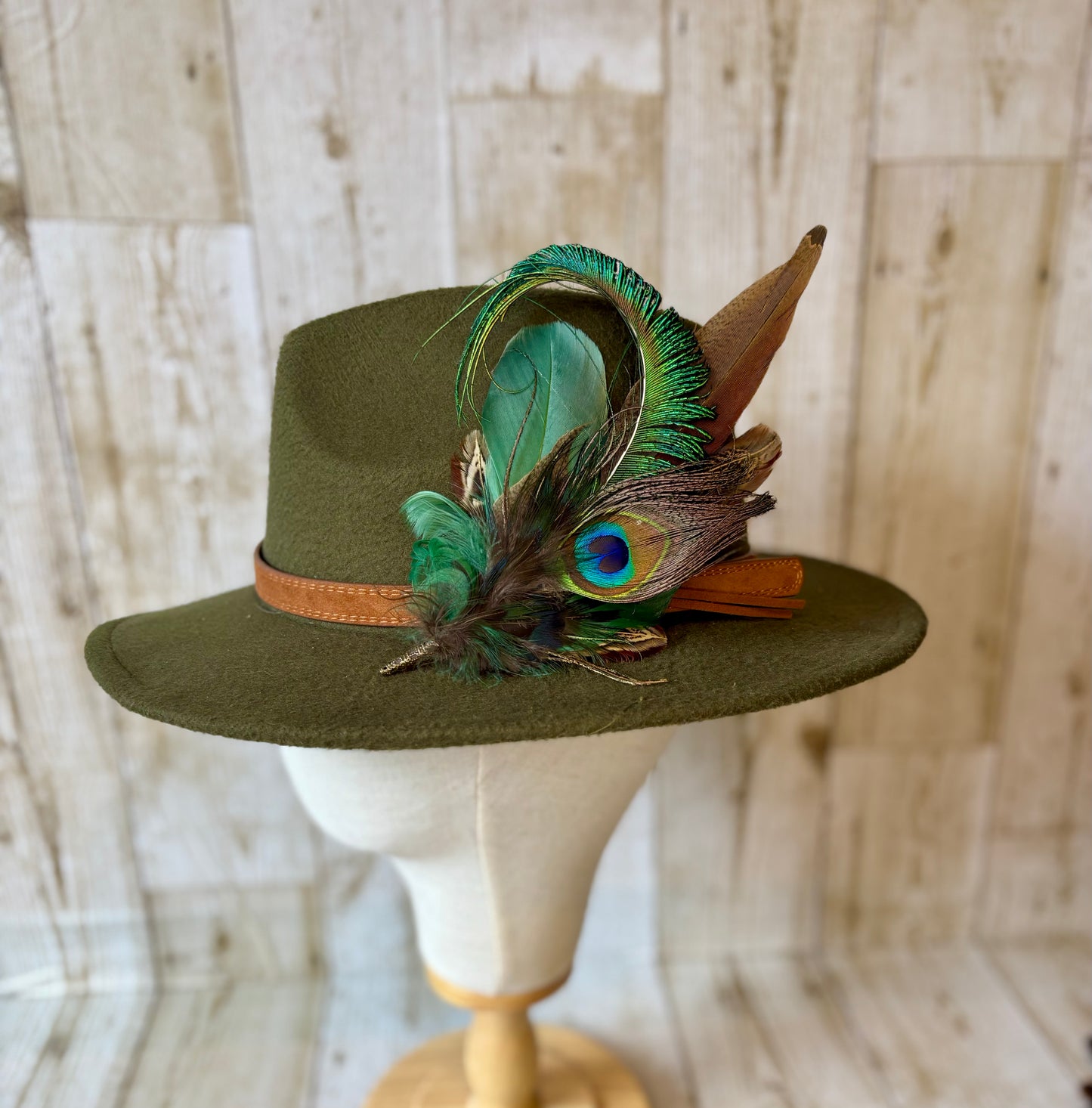 Pheasant feather and peacock feather pin.