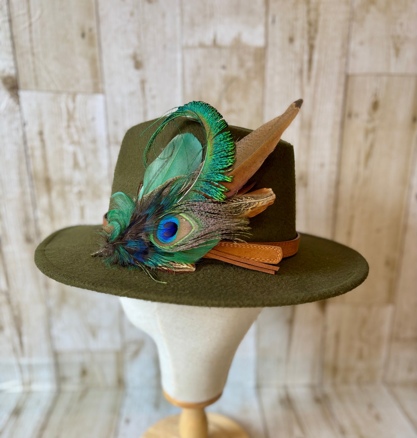 Pheasant feather and peacock feather pin.