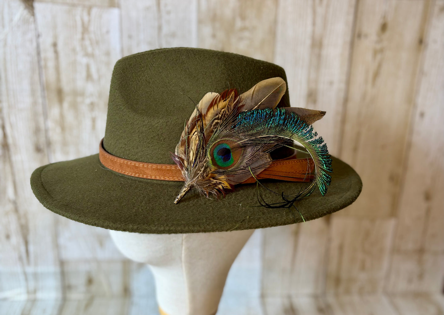 Pheasant feather and peacock feather pin.