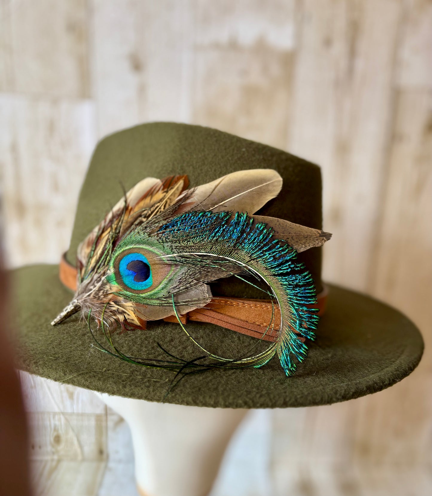 Pheasant feather and peacock feather pin.