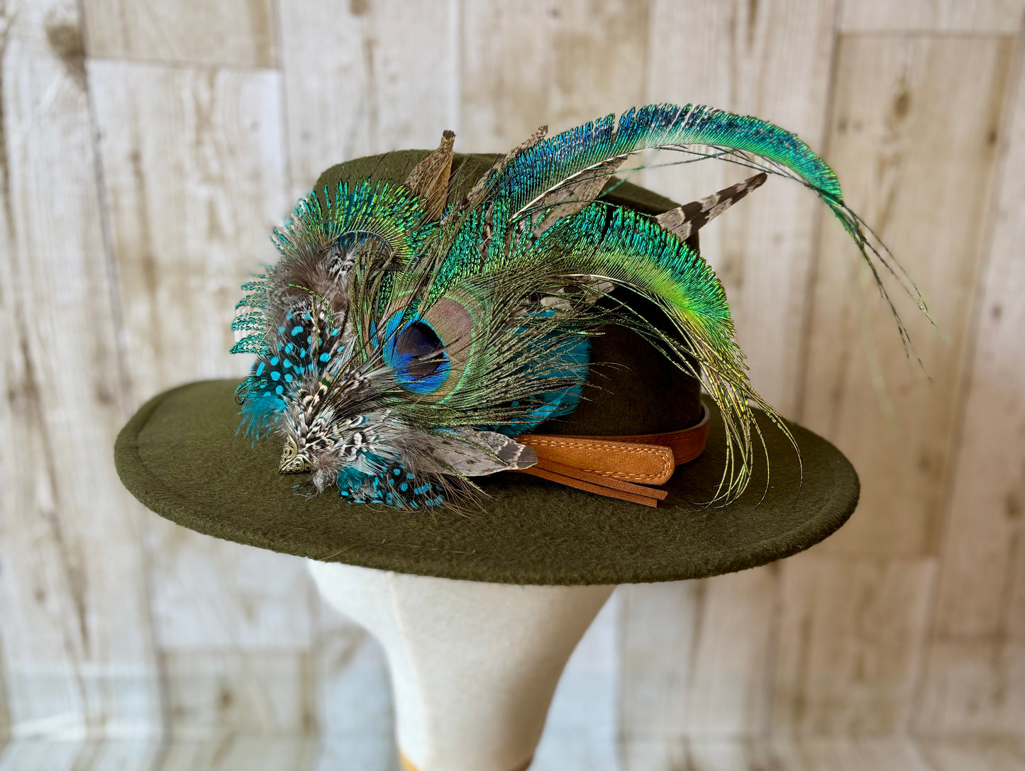 Pheasant feather and peacock feather pin.
