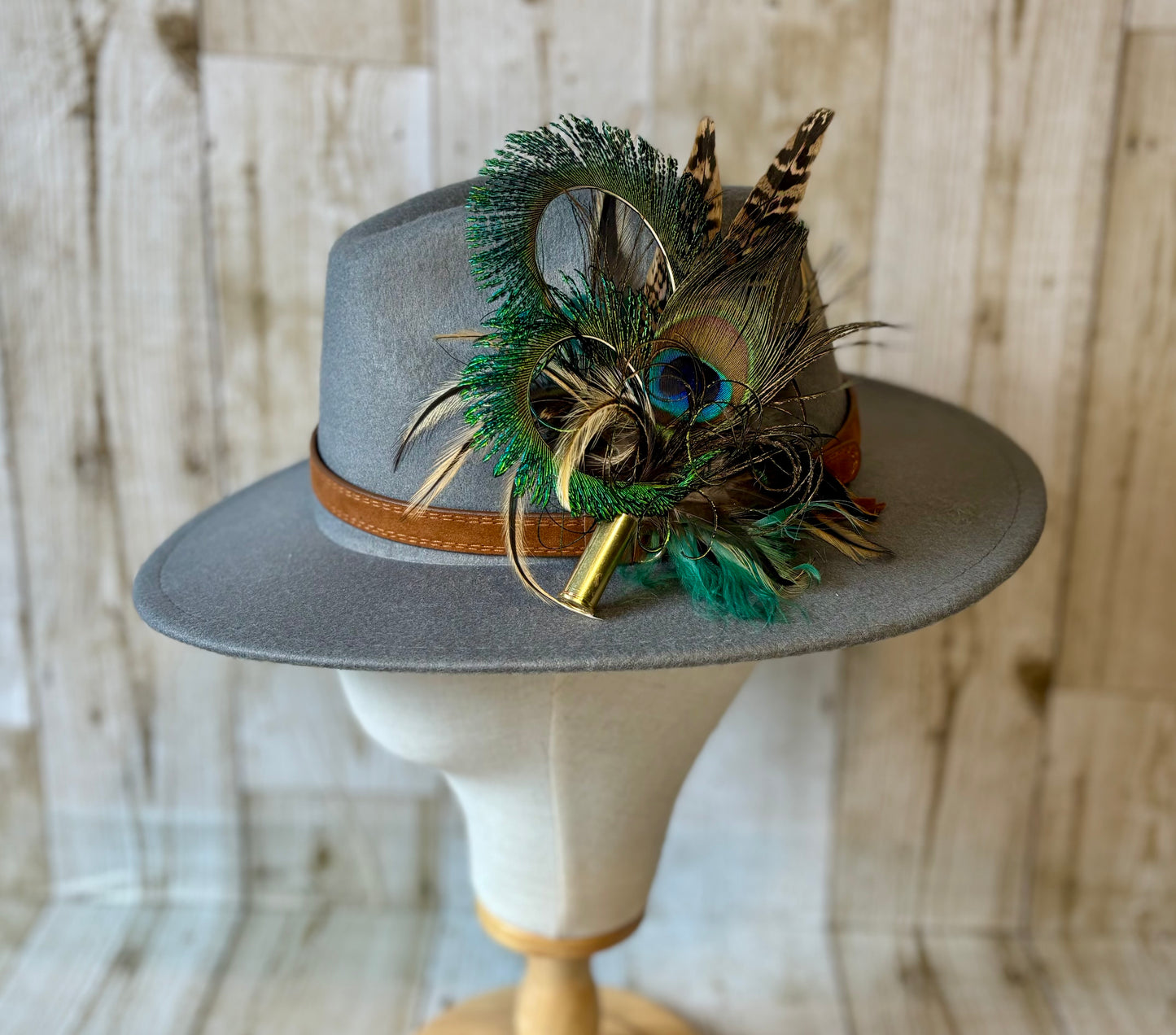 Pheasant feather and peacock feather pin.