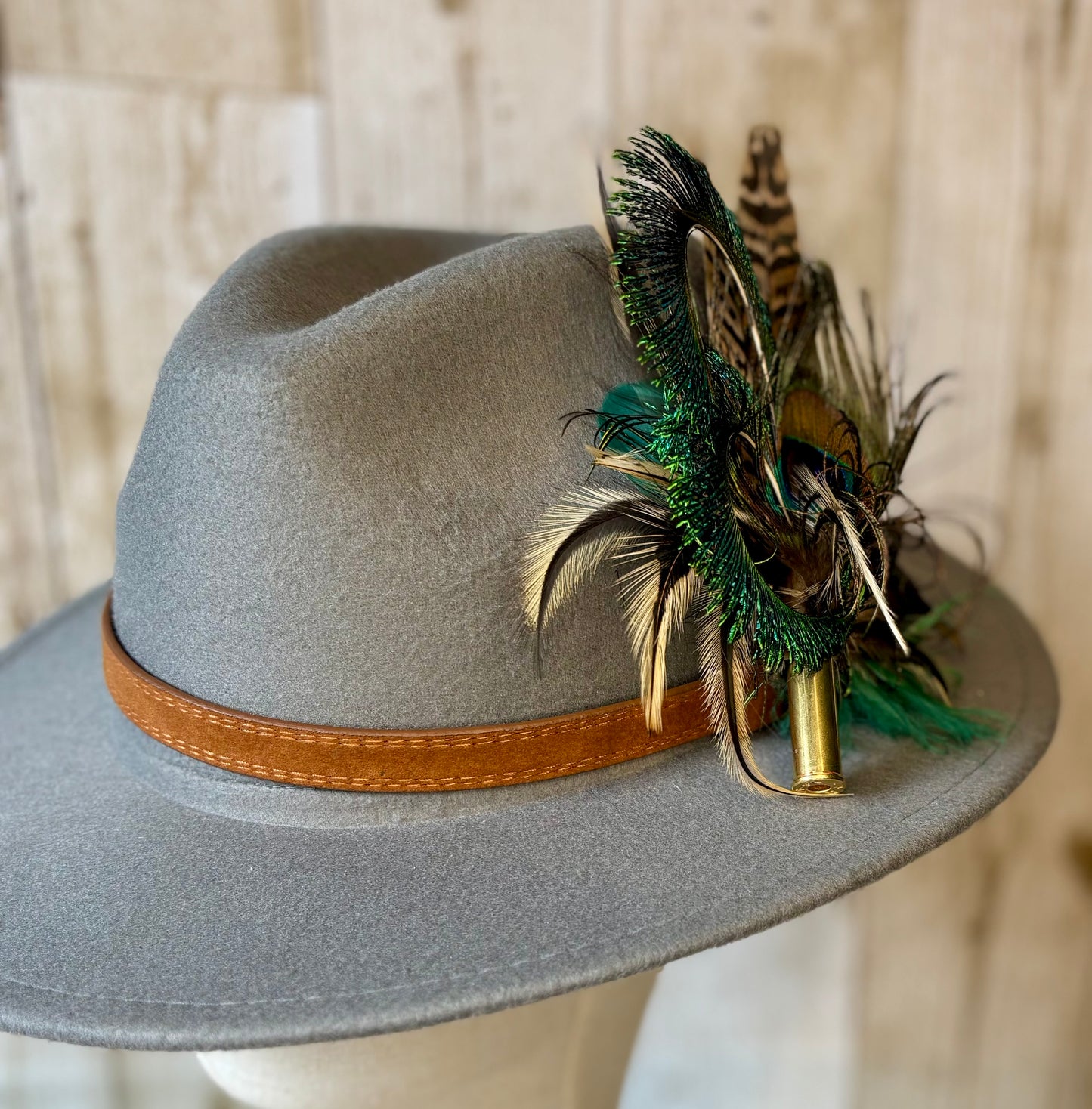 Pheasant feather and peacock feather pin.