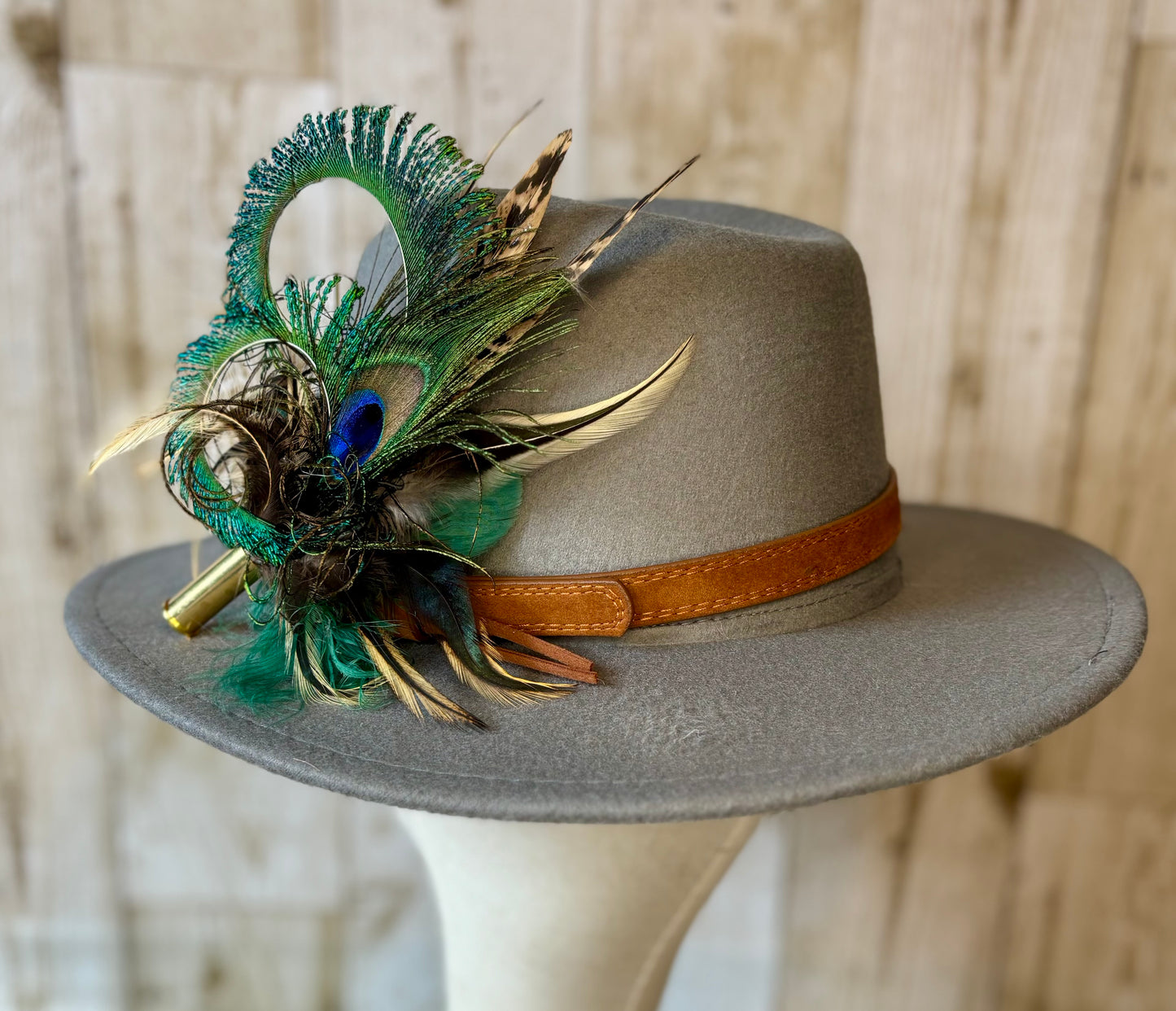 Pheasant feather and peacock feather pin.