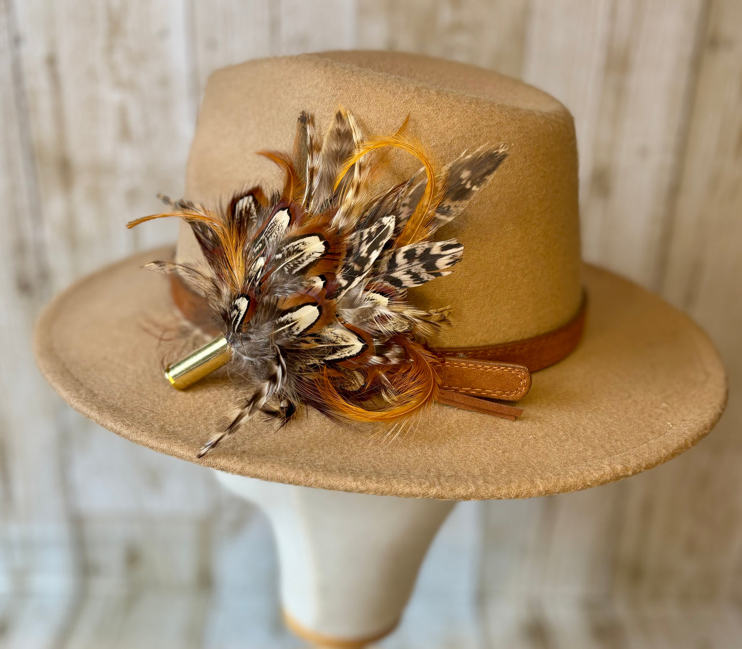 Pheasant feather hat pin.
