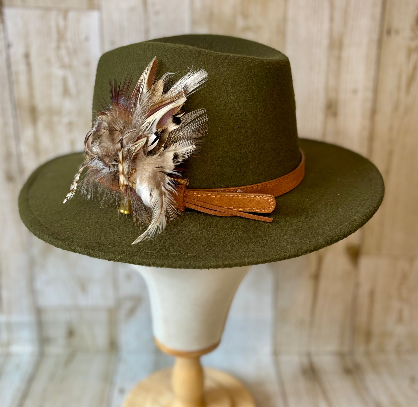 Pheasant feather hat pin.