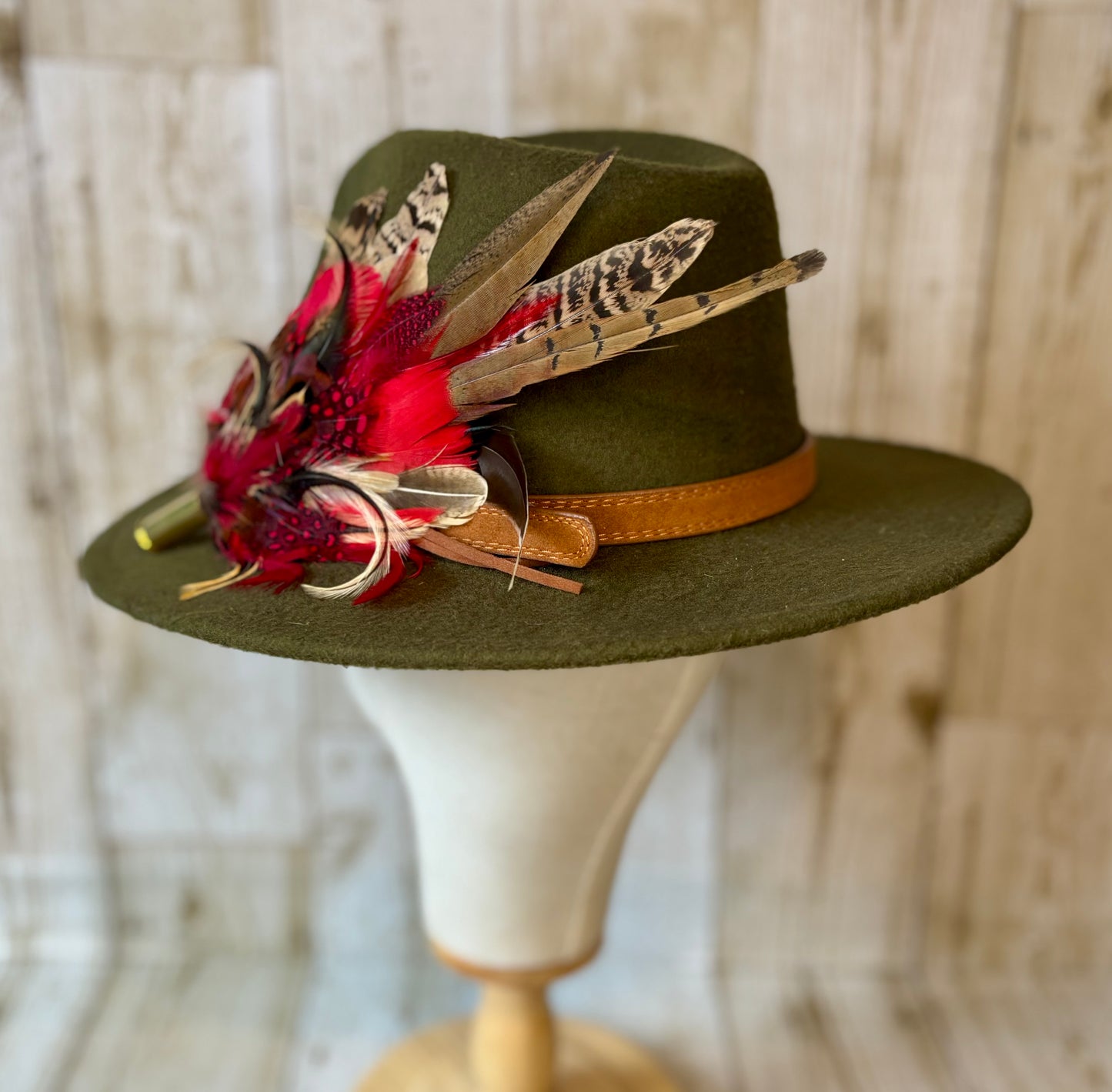 Pheasant feather hat pin.