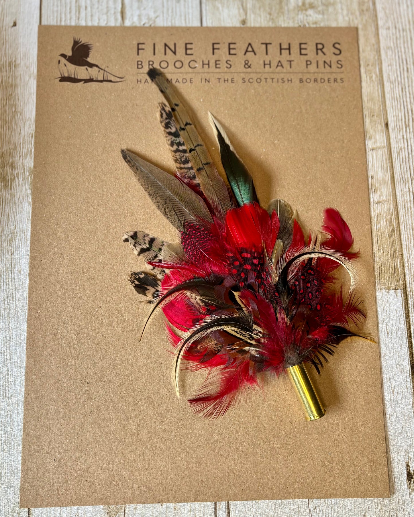 Pheasant feather hat pin.