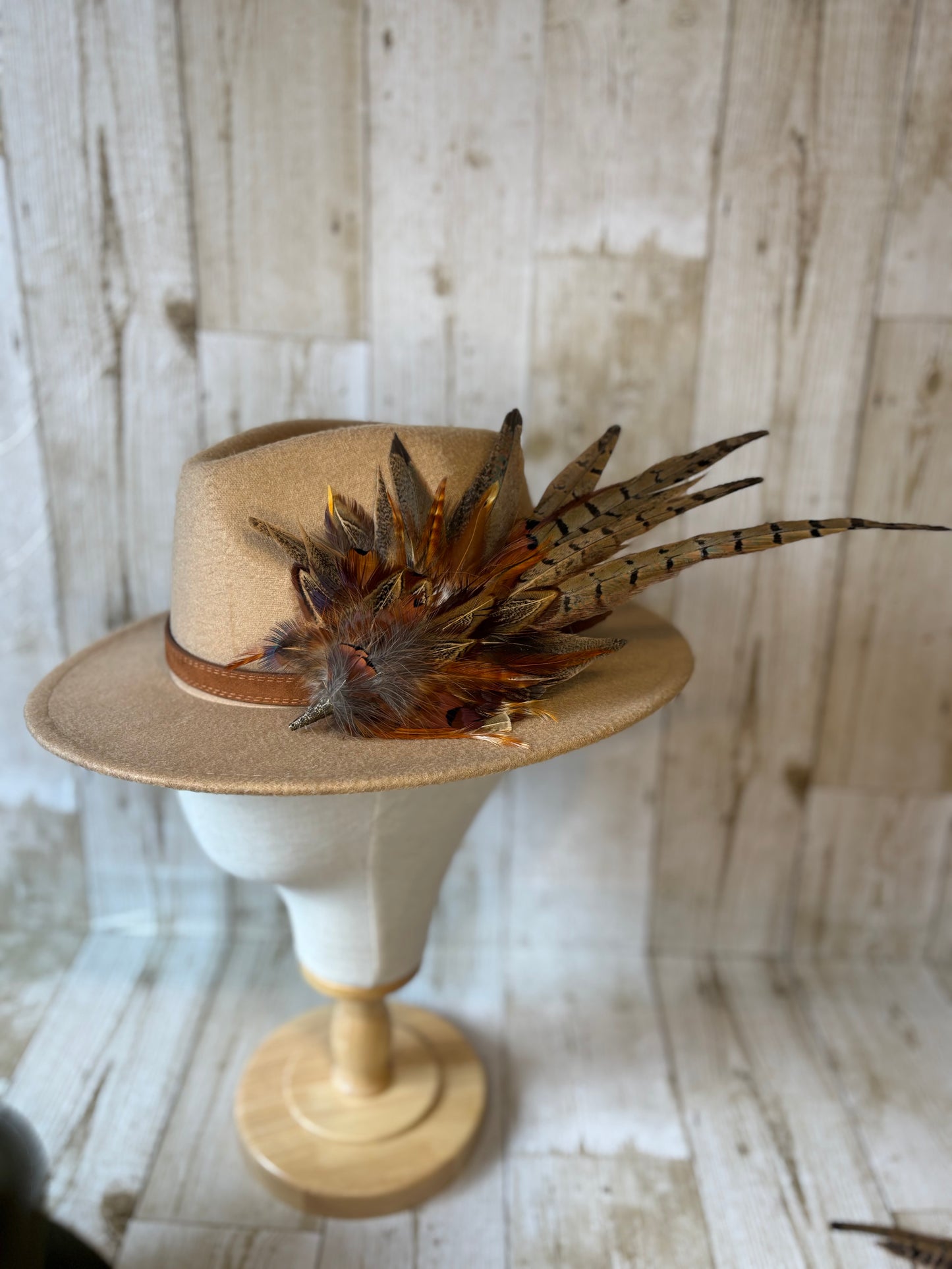 Pheasant feather hat pin.